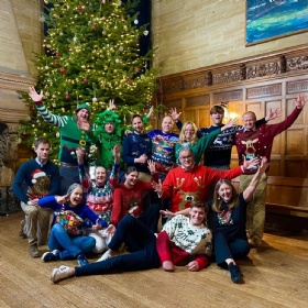 cottesmore school michaelmas christmas happy teachers wearing elf costumes jumpers tree